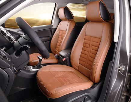 Brown leather sits